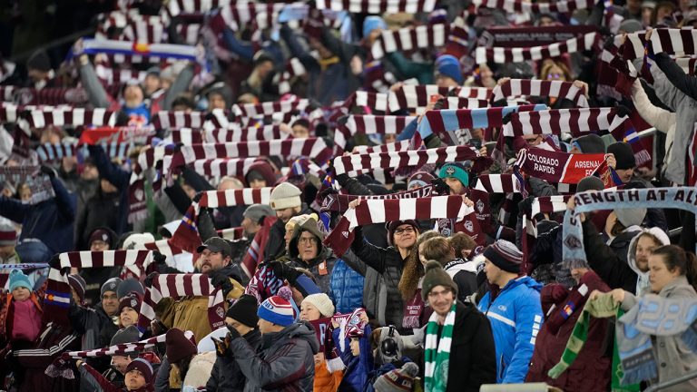 Fans welcome the Colorado Rapids to the pitch for an MLS soccer match against Sporting Kansas City on Saturday, March 4, 2023, in Commerce City, Colo. (David Zalubowski/AP)