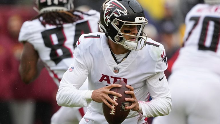 Atlanta Falcons quarterback Marcus Mariota looking to pass the ball against the Washington Commanders during the first half of an NFL football game, Sunday, Nov. 27, 2022, in Landover, Md. (Alex Brandon/AP)