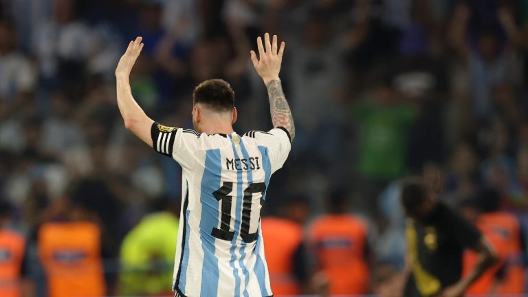 Argentina's Lionel Messi celebrates scoring the opening goal during an international friendly soccer match against Curacao in Santiago del Estero, Argentina, Tuesday, March 28, 2023. Messi scored his 100th goal with the national soccer team. (AP)