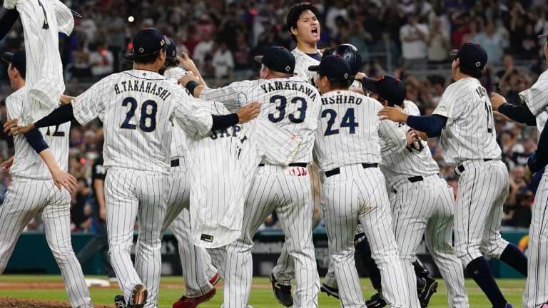 Japan pitcher Shohei Ohtani (16) celebrates after defeating the U.S. at the World Baseball Classic final game, Tuesday, March 21, 2023, in Miami. (Marta Lavandier/AP)