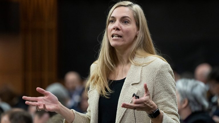 Minister of Sport Pascale St-Onge rises during Question Period, Wednesday, February 15, 2023 in Ottawa. (Adrian Wyld/CP)