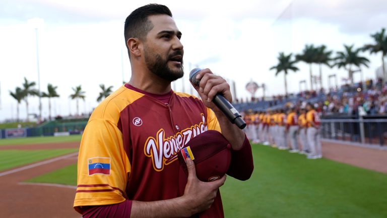 Venezuela's pitcher Martin Perez sings the Venezuelan national anthem before an exhibition baseball game between Venezuela and the Houston Astros, Wednesday, March 8, 2023, in West Palm Beach, Fla. (Lynne Sladky/AP)