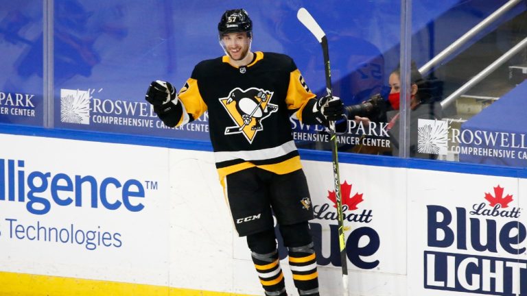 Pittsburgh Penguins Anthony Angello (57) celebrates his goal during the third period of an NHL hockey game against the Buffalo Sabres, Thursday, March 11, 2021, in Buffalo, N.Y. (Jeffrey T. Barnes/AP)