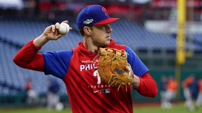 Philadelphia Phillies first baseman Rhys Hoskins warms up during batting practice before Game 3 of baseball's World Series between the Houston Astros and the Philadelphia Phillies on Monday, Oct. 31, 2022, in Philadelphia. The game was postponed by rain Monday night with the matchup tied 1-1. (Chris Szagola/AP)