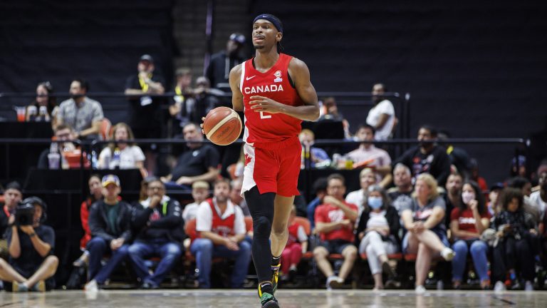 Canada's Shai Gilgeous-Alexander (2) dribbles up the court during second half FIBA international men's World Cup basketball qualifying action against Dominican Republic, in Hamilton, Ont., Friday, July 1, 2022. (Cole Burston/CP)