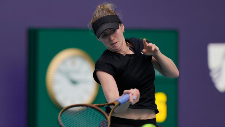 Katherine Sebov of Canada returns to Jessica Pegula during the Miami Open tennis tournament, Thursday, March 23, 2023, in Miami Gardens, Fla. (Marta Lavandier/AP)