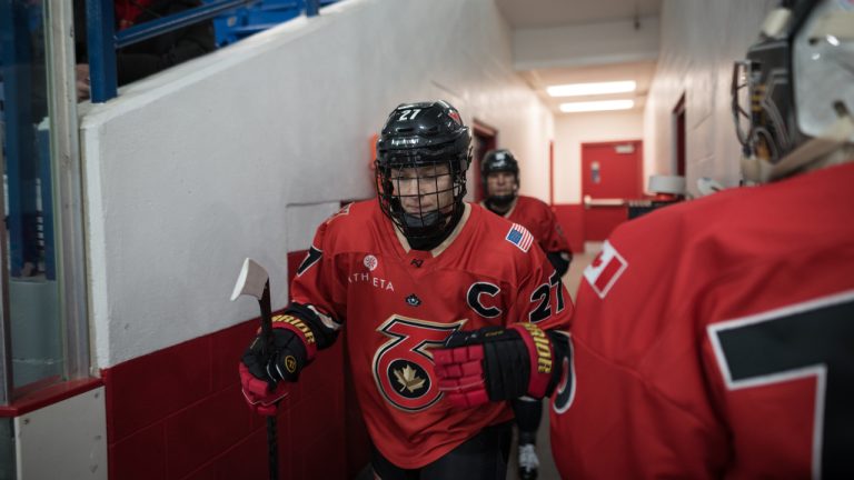 Shiann Darkangelo from the Toronto Six of the Premier Hockey Federation makes her way to the ice for warm up before playing against the Connecticut Whale. (Tijana Martin/CP)