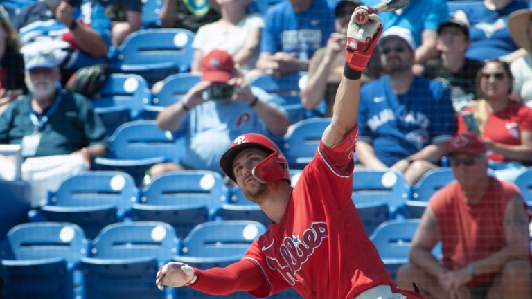 Philadelphia Phillies’ Trea Turner hits a two-run home run during a spring training game at TD Ballpark in Dunedin, Fla., Monday, March 27, 2023. (CP)