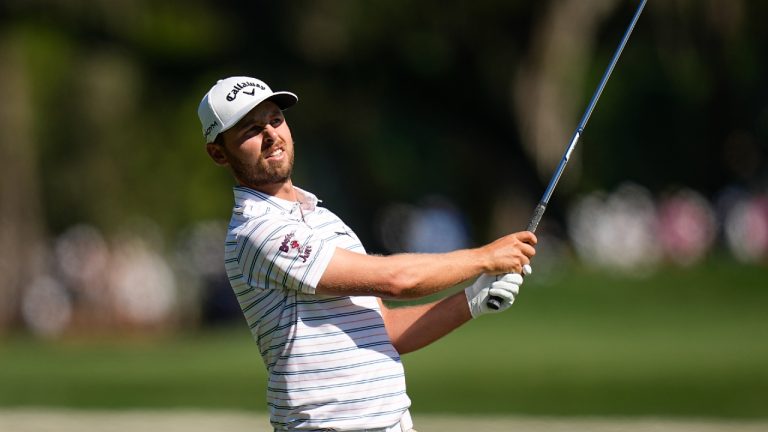 Adam Svensson, of Canada, watch his shot from the sixth fairway during the third round of the Players Championship golf tournament Saturday, March 11, 2023, in Ponte Vedra Beach, Fla. (Eric Gay/AP)