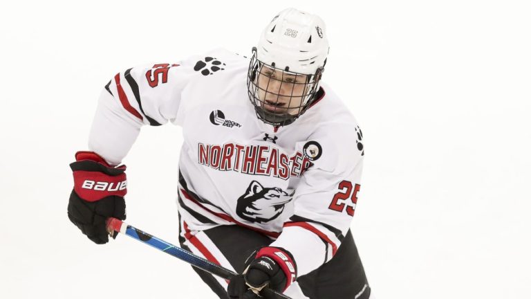 Northeastern Huskies forward Aidan McDonough (25) during an NCAA hockey game against the Merrimack Warriors on Saturday, Dec. 12, 2020, in Boston, Massachusetts. The Vancouver Canucks have signed McDonough to a two-year entry-level contract. (Adam Glanzman/AP)