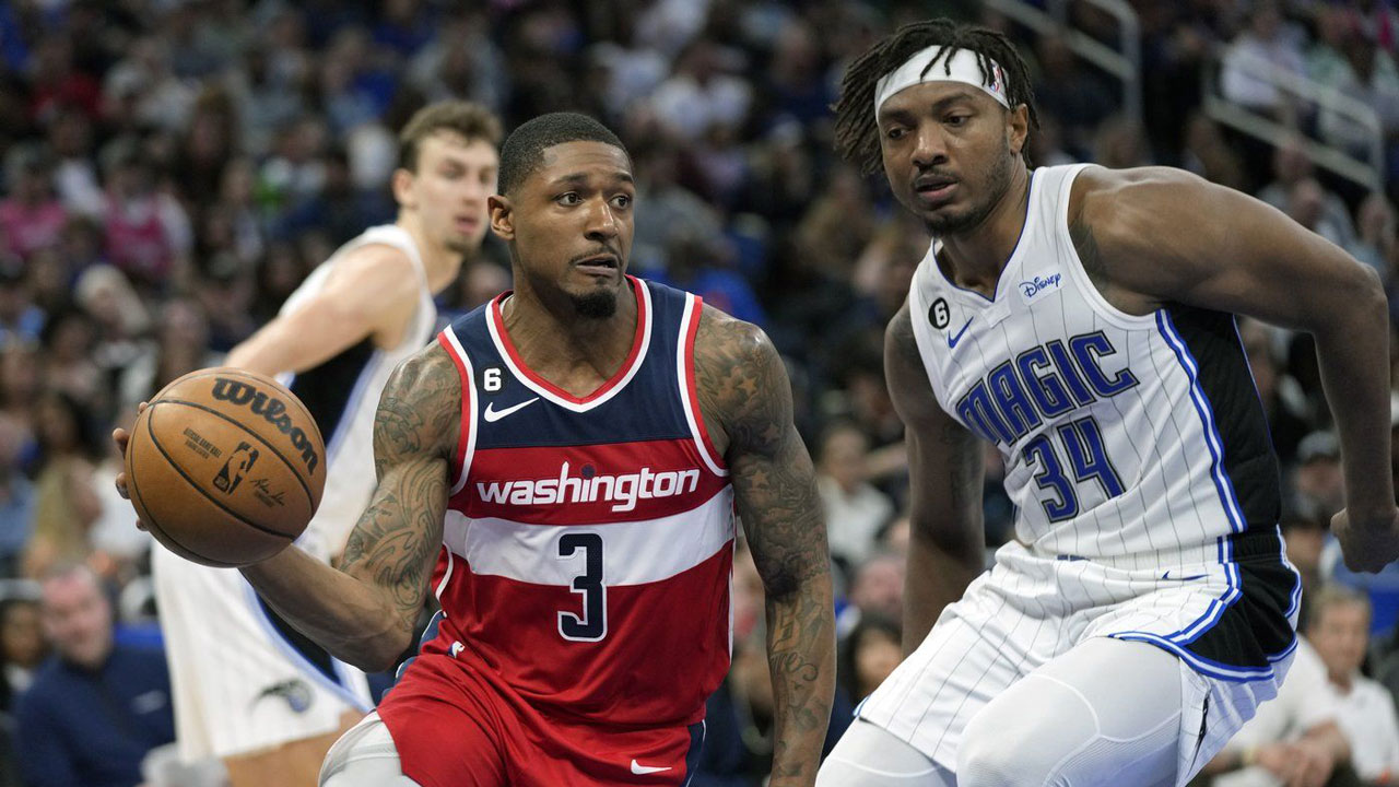 Washington Wizards' Bradley Beal (3) makes a move to get around Orlando Magic's Wendell Carter Jr. (34) during the second half of an NBA basketball game. (John Raoux/AP)
