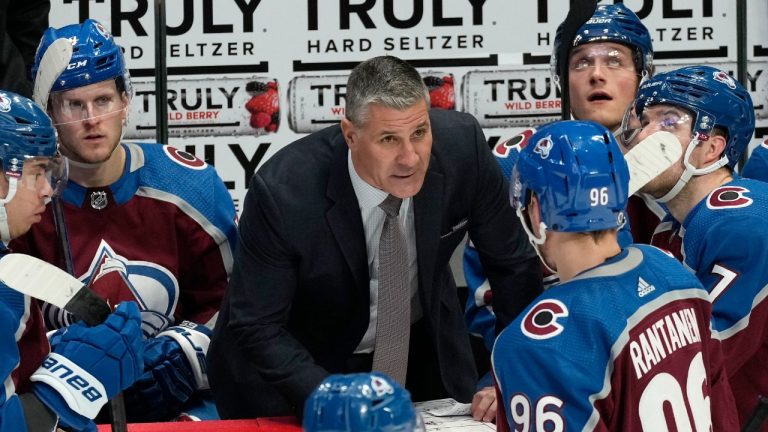 Colorado Avalanche head coach Jared Bednar directs his players during a time out in the third period of an NHL hockey game against the Buffalo Sabres Thursday, Dec. 15, 2022, in Denver. (David Zalubowski/AP)