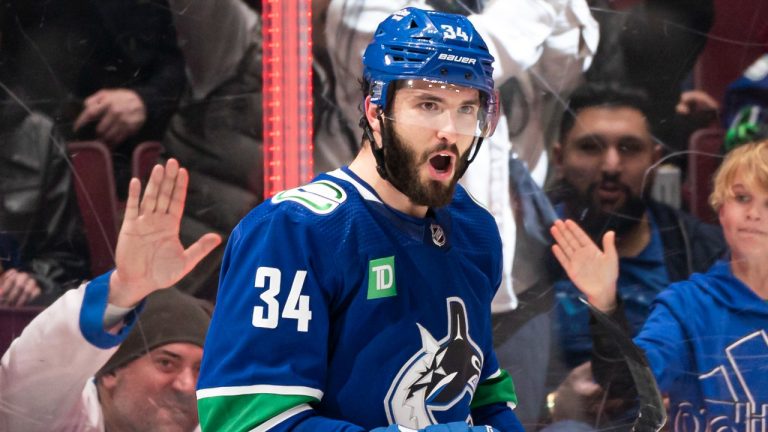 Vancouver Canucks' Phillip Di Giuseppe celebrates after scoring a goal against the Philadelphia Flyers during third period NHL hockey action in Vancouver, B.C., Saturday, February 18, 2023. (Rich Lam/CP)