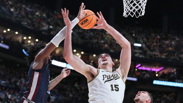 Zach Edey #15 of the Purdue Boilermakers grabs a rebound against the Fairleigh Dickinson Knights during the first half in the first round of the NCAA Men's Basketball Tournament at Nationwide Arena on March 17, 2023 in Columbus, Ohio. (Andy Lyons/Getty Images)