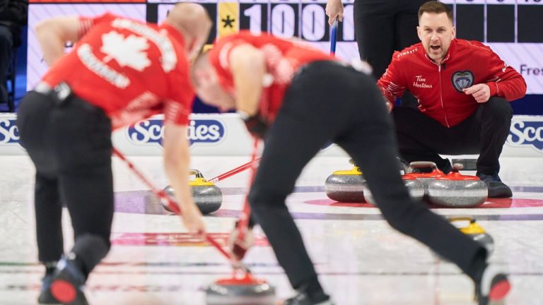 Team Canada skip Brad Gushue yells to his sweepers during CanadaÕs first draw against British Columbia at the 2023 Tim Hortons Brier at Budweiser Gardens in London, Ont. on Friday, March 3, 2023. (Geoff Robins/CP)