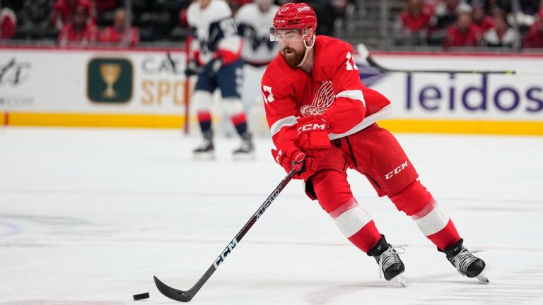 Former Detroit Red Wings defenceman Filip Hronek skates with the puck against the Washington Capitals during the second period of an NHL hockey game, Tuesday, Feb. 21, 2023, in Washington. (Julio Cortez/AP)