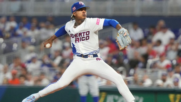 Puerto Rico starting pitcher Marcus Stroman (0) aims a pitch during the second inning of a World Baseball Classic game against Nicaragua. (Marta Lavandier/AP)