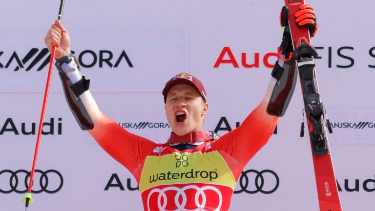 The winner Switzerland's Marco Odermatt celebrates after winning an alpine ski, men's World Cup giant slalom in Kranjska Gora, Slovenia, Sunday, March 12, 2023. (Giovanni Pizzato/AP)