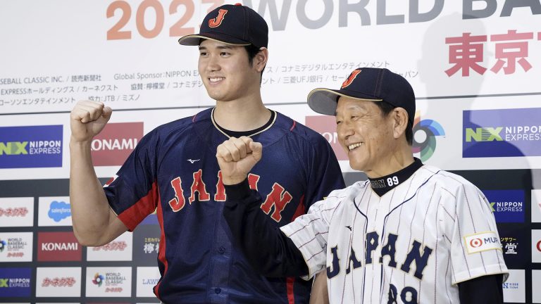 Shohei Ohtani, left, of Los Angeles Angels, and Japan's manager Hideki Kuriyama, right. (Lori Sagisawa/Kyodo News via AP)