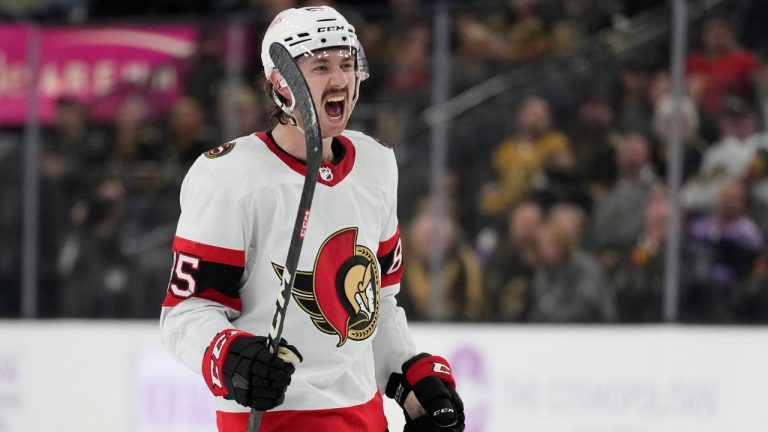 Ottawa Senators defenceman Jake Sanderson celebrates after scoring Vegas Golden Knights during the first period of an NHL hockey game Wednesday, Nov. 23, 2022, in Las Vegas. (John Locher/AP Photo)