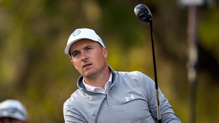 Jordan Spieth watches his tee shot on the 12th hole during the second round of the Players Championship golf tournament Friday, March 10, 2023, in Ponte Vedra Beach, Fla. (Charlie Neibergall/AP)