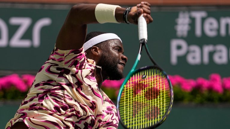 Frances Tiafoe, of the United States, serves to Cameron Norrie, of Britain, at the BNP Paribas Open tennis tournament Wednesday, March 15, 2023, in Indian Wells, Calif. (Mark J. Terrill/AP)