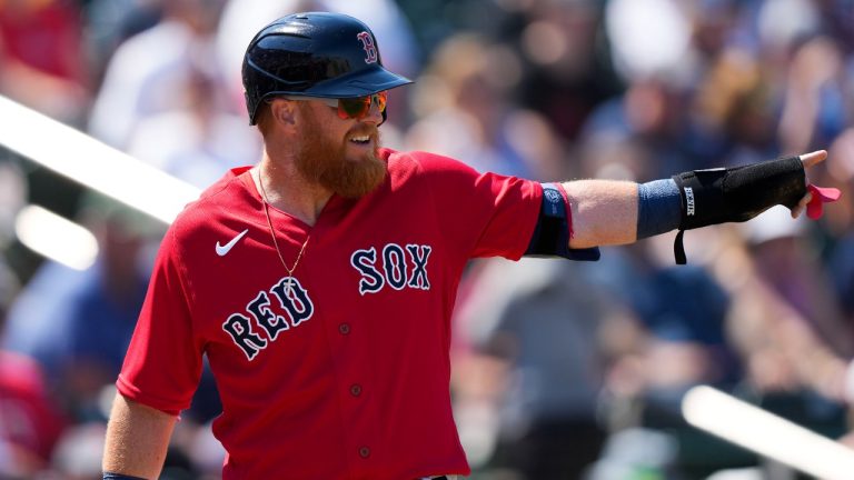 Boston Red Sox third baseman Justin Turner reacts after scoring in the first inning of a spring training baseball game against the Minnesota Twins in Fort Myers, Fla., Friday, March 3, 2023. (Gerald Herbert/AP)