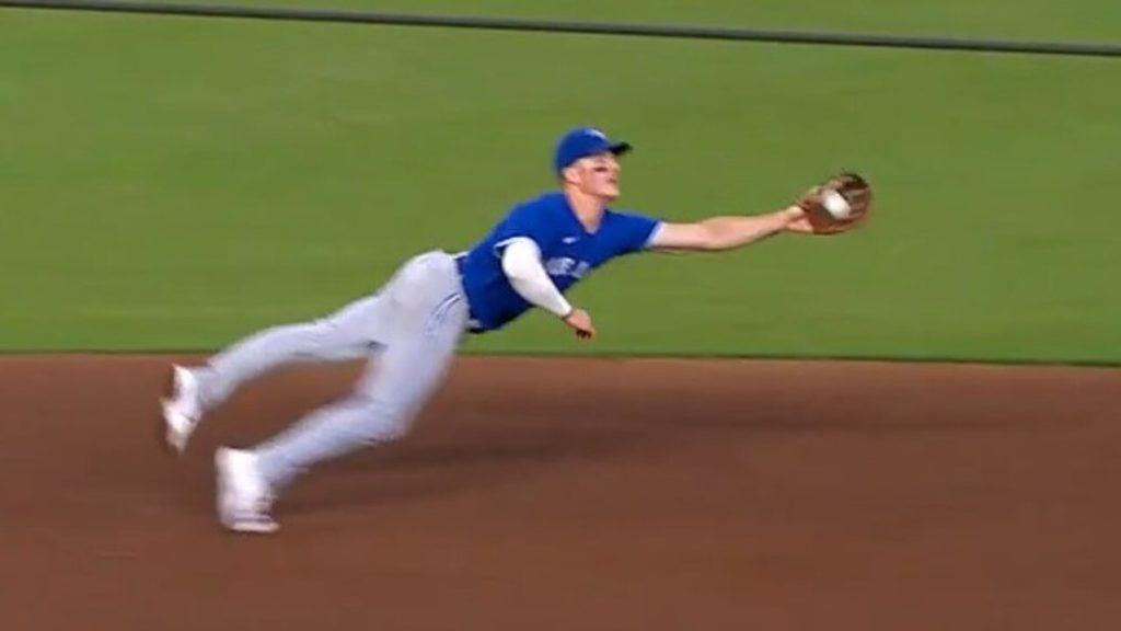 Houston Astros' Craig Biggio makes a diving catch of a ball hit by