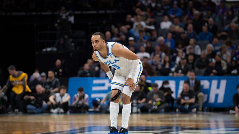 UCLA guard Amari Bailey holds the back of his leg after falling during the first half of the team's second-round college basketball game against Northwestern in the men's NCAA Tournament, Saturday, March 18, 2023, in Sacramento, Calif. (José Luis Villegas/AP)