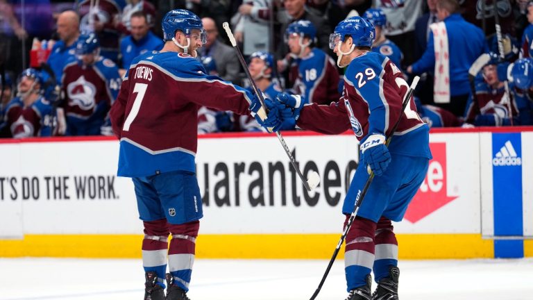 Colorado Avalanche defenseman Devon Toews (7) celebrates his goal against the Seattle Kraken with Nathan MacKinnon (29) during the third period of Game 2 of a first-round NHL hockey playoff series Thursday, April 20, 2023, in Denver. (Jack Dempsey/AP)