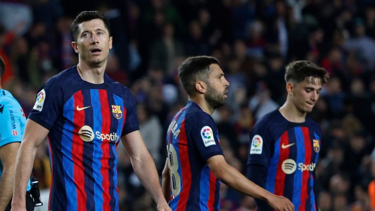 Barcelona's Robert Lewandowski, Gavi and Jordi Alba gesture at the end of the Spanish La Liga soccer match between Barcelona and Girona at the Camp Nou stadium in Barcelona, Spain, Monday, April 10, 2023. (Joan Monfort/AP Photo)