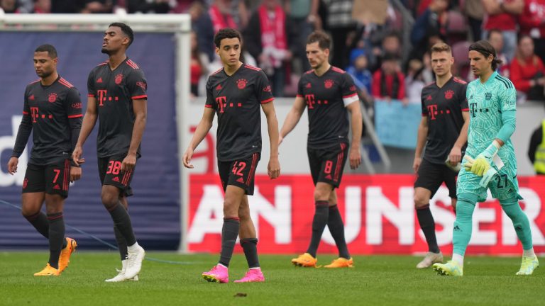 Bayern players leave the pitch after the German Bundesliga soccer match between 1. FSV Mainz 05 and FC Bayern Munich at the Mewa Arena in Mainz, Germany, Saturday, April 22, 2023. (Matthias Schrader/AP)