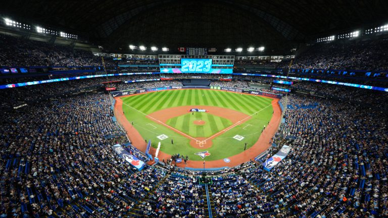 Fans wait for pregame festivities to begin prior to MLB American League baseball action between the Toronto Blue Jays and Detroit Tigers in Toronto on Tuesday, April 11, 2023. (Frank Gunn/CP)