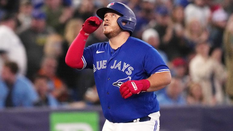 Toronto Blue Jays' Alejandro Kirk watches his solo home run off Seattle Mariners starting pitcher Luis Castillo during second inning American League MLB baseball action in Toronto on Friday, April 28, 2023. (Chris Young/CP)