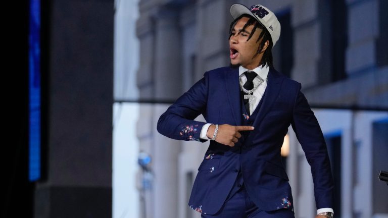 Ohio State quarterback C.J. Stroud reacts after being chosen by the Houston Texans with the second overall pick during the first round of the NFL football draft, Thursday, April 27, 2023, in Kansas City, Mo. (Jeff Roberson/AP)