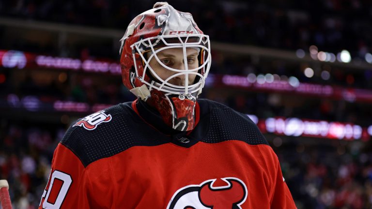 New Jersey Devils goaltender Akira Schmid skates off the ice after the team's loss in a shootout to the Tampa Bay Lightning in an NHL hockey game Thursday, March 16, 2023, in Newark, N.J. (Adam Hunger/AP) 