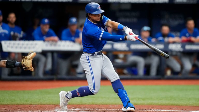 Toronto Blue Jays infielder Santiago Espinal gets a base hit. (Gerald Herbert/AP) 