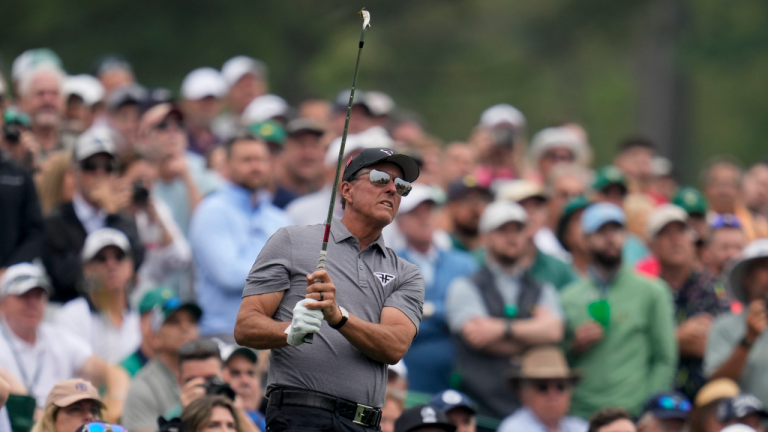 Phil Mickelson follows his shot on the 12th hole during a practice for the Masters golf tournament at Augusta National Golf Club, Tuesday, April 4, 2023, in Augusta, Ga. (AP)