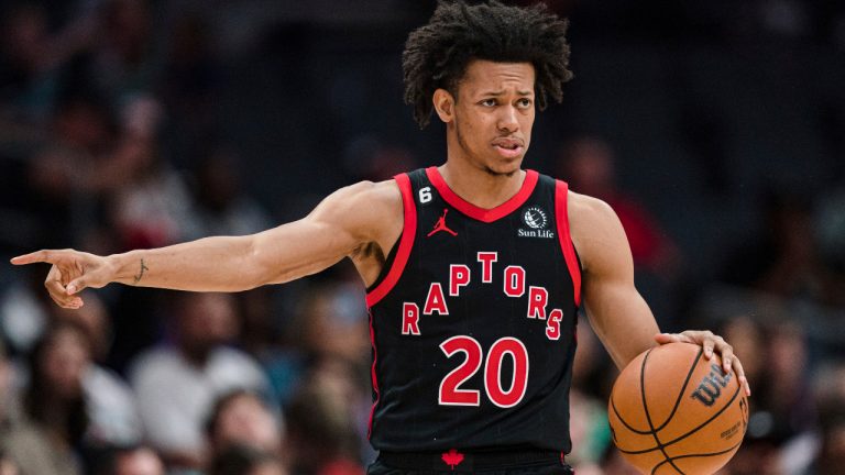 Toronto Raptors guard Jeff Dowtin Jr. directs a play against the Charlotte Hornets during the second half of an NBA basketball game in Charlotte, N.C., Tuesday, April 4, 2023. (Jacob Kupferman/AP) 