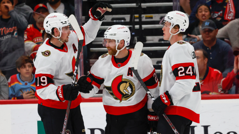 Ottawa Senators right wing Claude Giroux (28) celebrates a goal against the Florida Panthers with right wing Drake Batherson (19) and defenseman Jacob Bernard-Docker (24) during the second period of an NHL hockey game Thursday, April 6, 2023, in Sunrise, Fla. (AP)