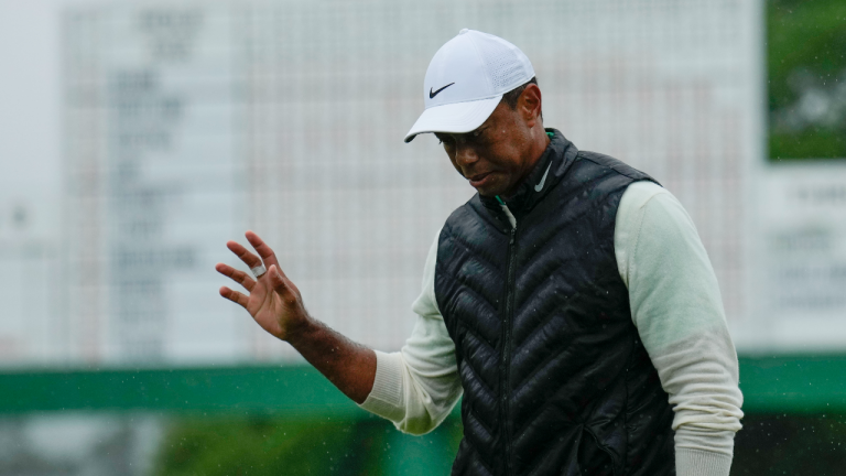 Tiger Woods waves after his weather delayed second round of the Masters golf tournament at Augusta National Golf Club on Saturday, April 8, 2023, in Augusta, Ga. (AP)