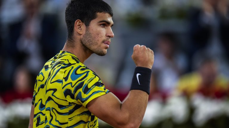 Carlos Alcaraz, from Spain, celebrates his victory over Grigor Dimitrov, of Bulgaria, at the Madrid Open tennis tournament in Madrid, Spain, Sunday, April 30, 2023. (AP Photo/Manu Fernandez)