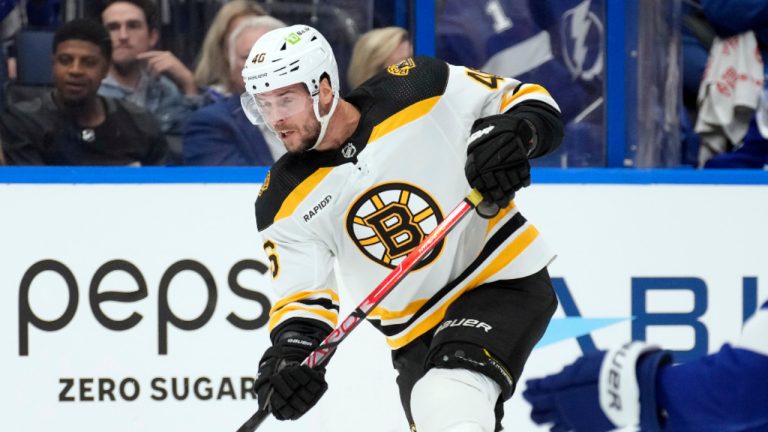 Boston Bruins center David Krejci (46) fires a slapshot past Tampa Bay Lightning goaltender Andrei Vasilevskiy for a goal during the first period of an NHL hockey game Monday, Nov. 21, 2022, in Tampa, Fla. (Chris O'Meara/AP) 