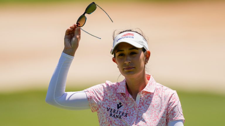 Cheyenne Knight waves after her putt on the eighth hole during the third round of the Chevron Championship women's golf tournament at The Club at Carlton Woods on Saturday, April 22, 2023, in The Woodlands, Texas. (David J. Phillip/AP)