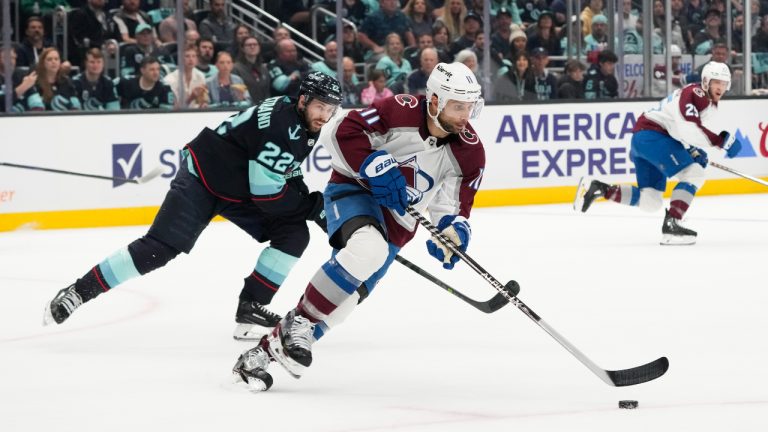 Colorado Avalanche centre Andrew Cogliano (11) in action against Seattle Kraken right wing Oliver Bjorkstrand (22) during the first period of Game 6 of an NHL hockey Stanley Cup first-round playoff series Friday, April 28, 2023, in Seattle. (Lindsey Wasson/AP)