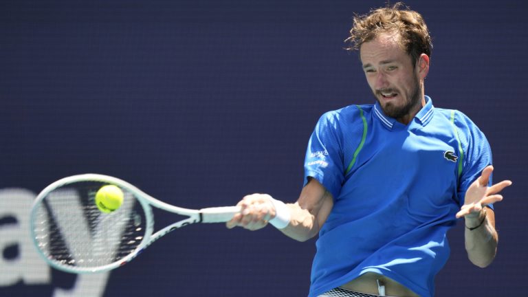 Daniil Medvedev, of Russia, returns a shot from Jannik Sinner, of Italy, during the men's singles finals of the Miami Open tennis tournament, Sunday, April 2, 2023, in Miami Gardens, Fla. (Wilfredo Lee/AP)