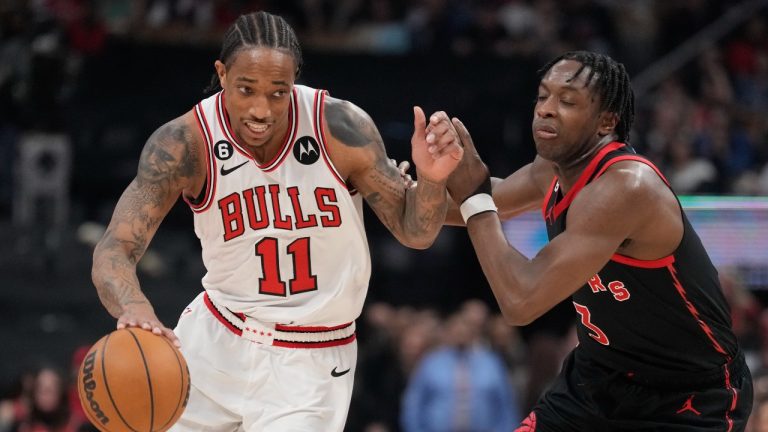 Chicago Bulls forward DeMar DeRozan (11) moves up court as Toronto Raptors forward O.G. Anunoby (3) defends during first half NBA basketball action in Toronto on Wednesday, April 12, 2023. (Frank Gunn/CP)