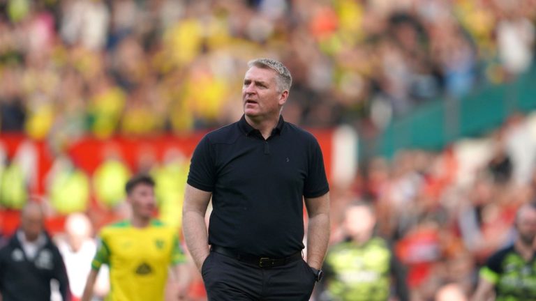 Dean Smith walks from the pitch after the English Premier League soccer match between Manchester United and Norwich City at Old Trafford stadium in Manchester, England, Saturday, April 16, 2022. (Jon Super/AP Photo)