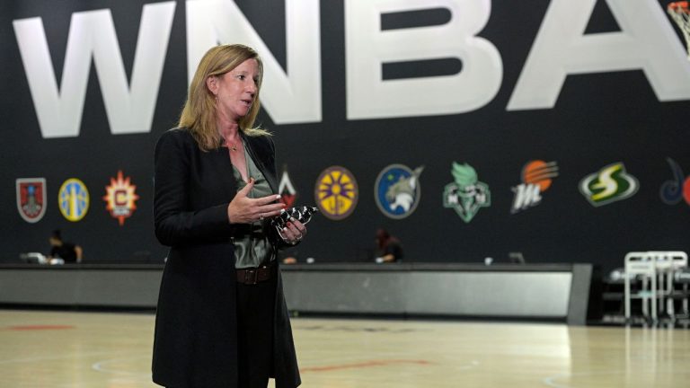 WNBA Commissioner Cathy Engelbert answers questions about a postponed game between the Seattle Storm and the Minnesota Lynx after Game 1 of a WNBA basketball semifinal round playoff game between the Connecticut Sun and the Las Vegas Aces, in Bradenton, Fla. 2021. (Phelan M. Ebenhack/AP Photo)