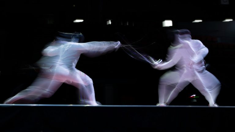 A fencing World Cup event in Poland has been canceled because the sport's governing body decided last month to let Russians and Belarusians compete. (Peter Klaunzer/Keystone via AP)